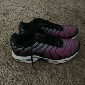 Purple and black Air Nike shoes